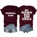 Burgundy crewneck tee featuring My Nephew Hits and Steals white vintage typography - Burgundy