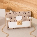 Women's beige printed crossbody bag with gold chain and white leather trim accents - White