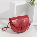 Deep red crocodile texture saddle crossbody bag with long thin shoulder strap - Red