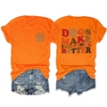 Close-up of Dogs Make Everything Better graphic print on casual orange t-shirt back - Orange