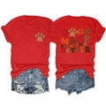 Flat lay of red T-shirt with 'DOGS MAKE EVERYTHING' print and ripped denim shorts - Red