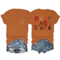 Flat lay of an orange t-shirt with Dogs Make Everything Better print and denim shorts - Burnt Orange