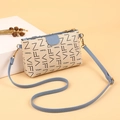 Beige leather phone bag with blue strap and letter print patterns for summer fashion - Beige & Blue
