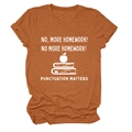 Close-up of brick red T-shirt fabric texture and white education slogan print - Burnt Orange (White Text)