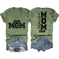 Detail of Senior Mom 2026 green V-neck t-shirt with ripped denim shorts set - Olive Green (Black Font)