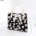 Black floral handbag with daisy print, white bow, and detachable shoulder strap - Black Daisy with Bowknot