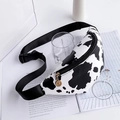 Stylish cow print crossbody fanny pack with adjustable strap and golden zipper detail - Cow Print