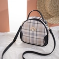 Beige plaid saddle bag with black leather trim and pearl bee metal buckle detail - Black