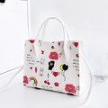 Sac à main blanc à imprimé floral avec motifs de dessins animés colorés - Dessin Animé Blanc