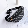 Fashionable black fanny pack with white geometric prints and gold hardware detail - Black Polka Dot