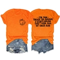 Flat lay of orange t-shirt with peach graphic and blue distressed denim shorts set - Orange (Black Font)