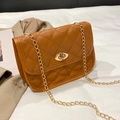 Quilted caramel leather shoulder bag with gold chain strap and turn-lock closure - Brown