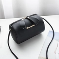 Black lychee texture cylinder shoulder bag with gold Sunnycity logo and zip detail - Black