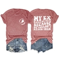 Flat lay detail of red slogan t-shirt with blue distressed denim shorts set - S / Rose Gold