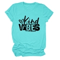 Close-up of Kind VIBES text and heart print on Tiffany blue short sleeve cotton T-shirt - S / Deep Water Blue