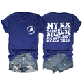 Detail view of the slogan print and distressed denim hem on this casual women's t-shirt set - S / Vintage Blue