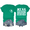 Detail of green cotton T-shirt featuring white slogan print and blue denim shorts - S / Dark Green