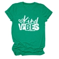 Macro detail of Kind VIBES print on emerald green cotton t-shirt with soft texture - S / Dark Green