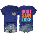 Flat lay of navy crewneck t-shirt with Boat Sun Lake print and denim shorts - Vintage Blue (White Print)