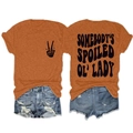 Vue détaillée avant et arrière du t-shirt orange texturé avec imprimé graphique noir - Orange Brûlé (Police Noire)