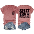 Flat lay of heather red t-shirt with Shit Show Supervisor text and ripped denim shorts - Rose Gold (Black Font)