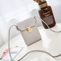 Minimalist light grey crossbody phone bag with a gold round push lock closure - Vertical / Gray