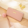 Pink quilted long wallet for women with pompom charm and wrist strap in PU leather - Pink