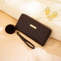 Dark brown quilted long wallet with golden metal plate and plush ball charm decoration - Coffee