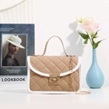 Quilted khaki crossbody bag with white contrast piping and gold chain strap - Khaki