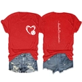 Flat lay of red Baseball Mama T-shirt front and back with distressed denim shorts - Red
