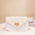 White chain crossbody bag with brown geometric print and golden metal buckle - White