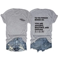 Flat lay of gray cotton T-shirt with back quote print and blue distressed denim shorts - Light Gray (Black Font)