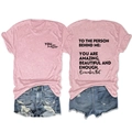 Front and back view of pink T-shirt featuring inspirational message TO THE PERSON BEHIND ME - Pink (Black Font)