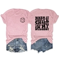 Detail view of pink cotton T-shirt featuring I WILL SMILE IN MY MUGSHOT slogan and heart print - S / Tops / Pink