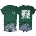 Flat lay view showing front and back of dark green slogan T-shirt with denim shorts - S / Tops / Retro Green/White Font