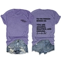 Detail view of purple cotton t-shirt with TO THE PERSON print and motivational text - Purple (Black Text)