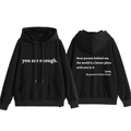 Detail of inspirational back text and kangaroo pocket on black hooded sweatshirt - S / Black