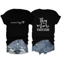 Flat lay of black round neck T-shirt with 'mimi' print and ripped denim shorts set - S / Black