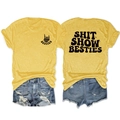 Close-up of Besties print on yellow cotton t-shirt with denim shorts outfit - Yellow