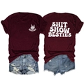 Front and back view of burgundy cotton T-shirt with SHIT SHOW BESTIES white graphic print - Burgundy