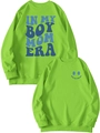 Detail of green boy mom era sweatshirt featuring ribbed cuffs and artistic blue lettering - Fluorescent Green