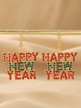 Detail of Happy New Year earrings with red and green rhinestones on golden alloy hooks - Gold with Red and Green Zirconia