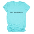 Close-up of the 'in my sourdough era' text print on a teal cotton crewneck t-shirt - S / Deep Water Blue (Black Font)