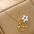 Macro shot of gold zodiac necklace featuring Cancer constellation and star charm - Cancer