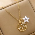 Macro detail of gold Leo zodiac necklace with crystal-inlaid ring and star charm - Leo