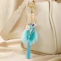 Portachiavi con colibrì blu con nappa e finta pietra su borsa in pelle crema - Stile Uccello Pom Pom
