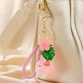 Portachiavi con elefante rosa, ciondoli in resina, foglia monstera e cinturino in pelle - Stile Elefante Rosa