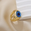 Detailed close-up of a wide gold-tone alloy ring featuring a realistic blue evil eye inlay - Gold Blue Round Pupil