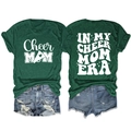 Detail of double-sided print on heather green Cheer Mom T-shirt and denim shorts - Vintage Green (White Font)