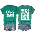 Detail of green cotton t-shirt with Cheer Mom graphic prints and casual denim shorts - Dark Green (White Font)